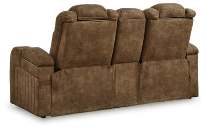 Wolfridge - Power Reclining Loveseat With Console /Adj Hdrst - Brindle