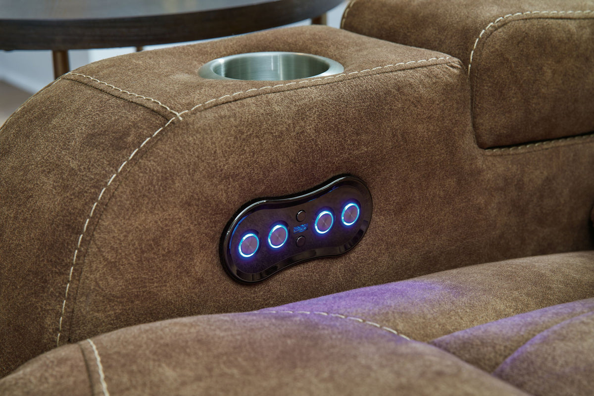 Wolfridge - Power Reclining Loveseat With Console /Adj Hdrst - Brindle